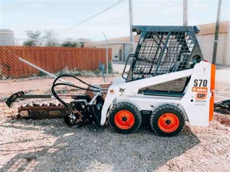 bobcat mini skid steer trencher|bobcat skid steer trencher attachment.